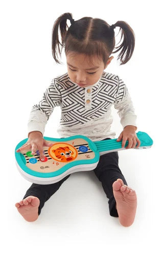 Ukelele canta y rasguea Magic Touch BABY EINSTEIN Hape