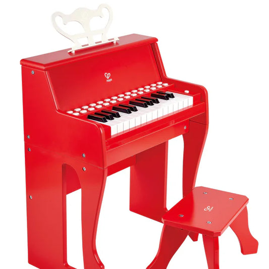Piano rojo con taburete Hape